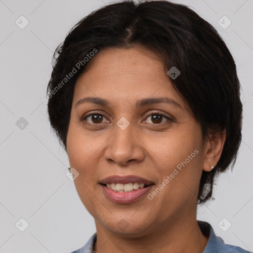 Joyful white adult female with medium  brown hair and brown eyes