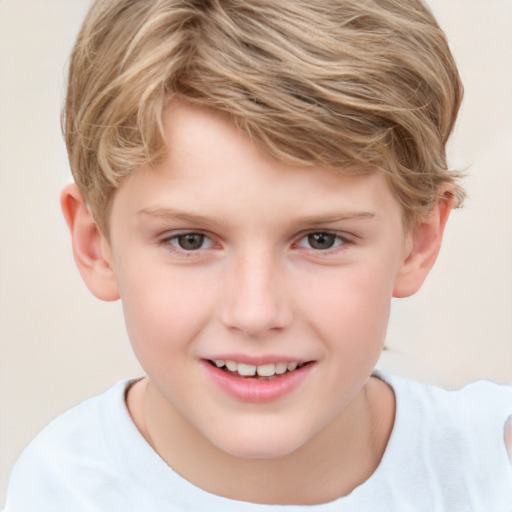 Joyful white child male with short  brown hair and brown eyes