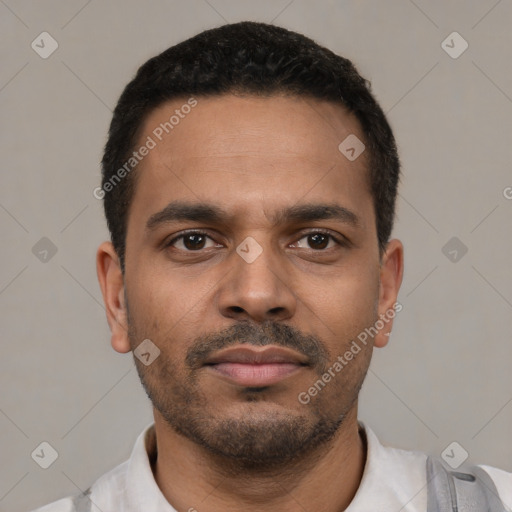 Neutral latino young-adult male with short  black hair and brown eyes