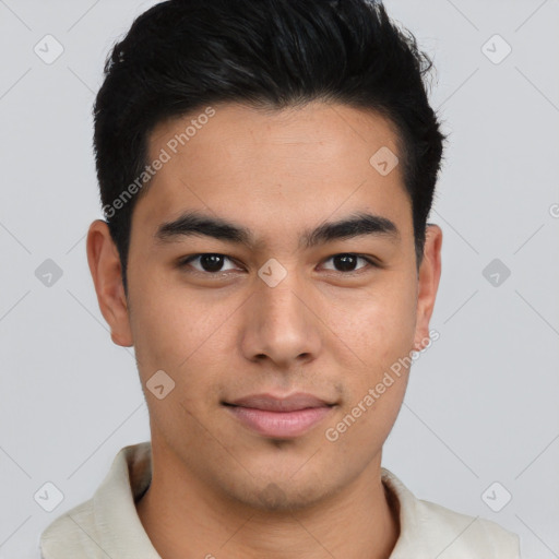 Joyful asian young-adult male with short  brown hair and brown eyes