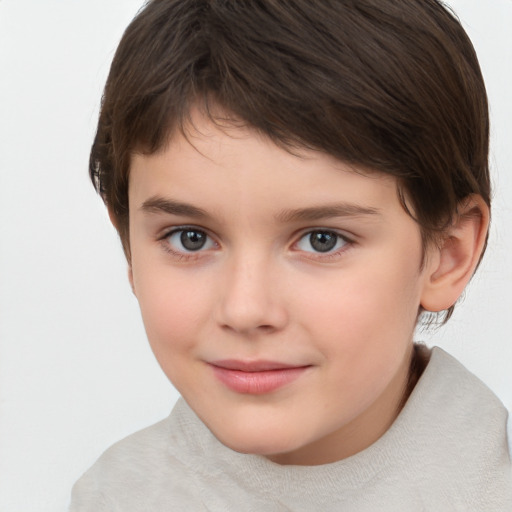 Joyful white child female with short  brown hair and brown eyes