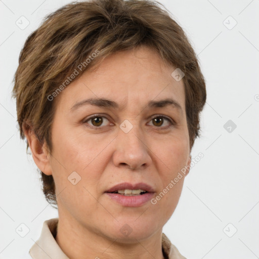 Joyful white adult female with short  brown hair and brown eyes