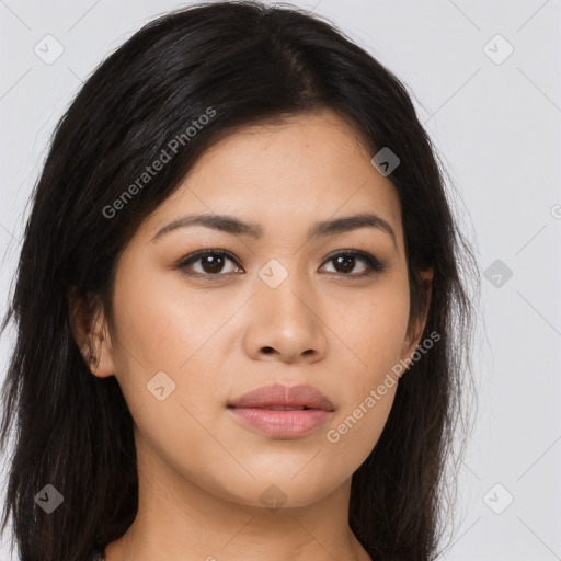 Joyful asian young-adult female with long  brown hair and brown eyes