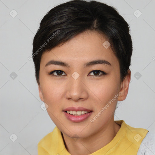 Joyful asian young-adult female with short  brown hair and brown eyes