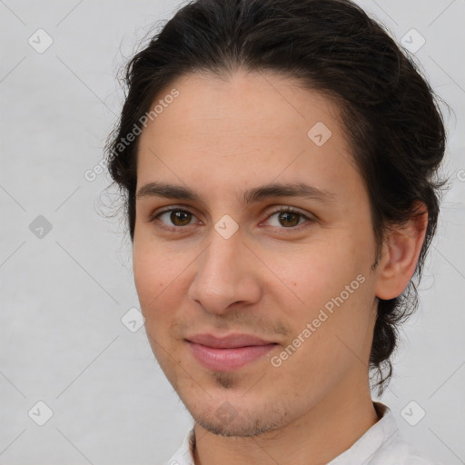 Joyful white young-adult female with short  brown hair and brown eyes