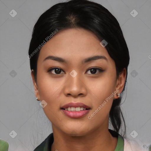 Joyful asian young-adult female with short  black hair and brown eyes