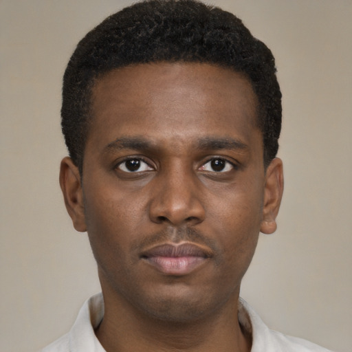 Neutral black young-adult male with short  brown hair and brown eyes