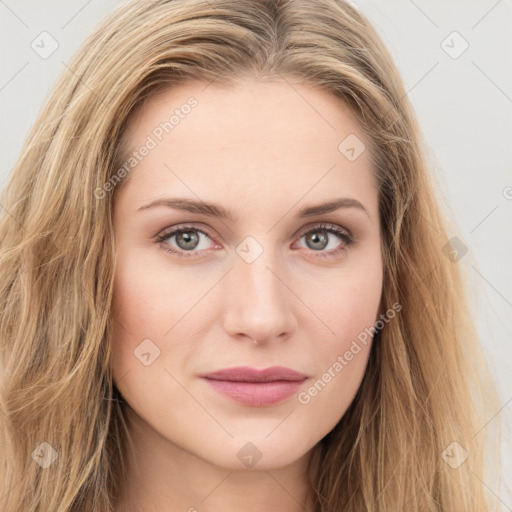 Joyful white young-adult female with long  brown hair and green eyes