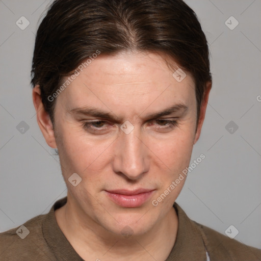 Joyful white adult female with short  brown hair and brown eyes