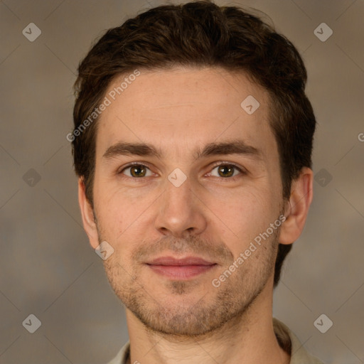 Joyful white adult male with short  brown hair and brown eyes