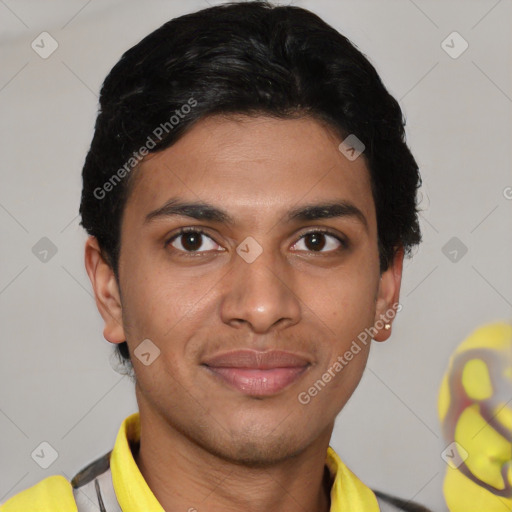 Joyful latino young-adult male with short  brown hair and brown eyes