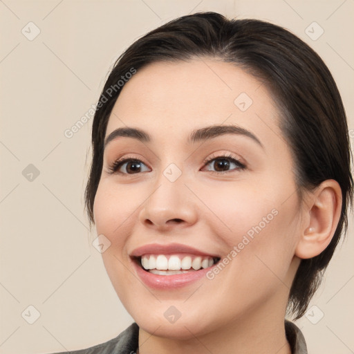 Joyful white young-adult female with medium  brown hair and brown eyes