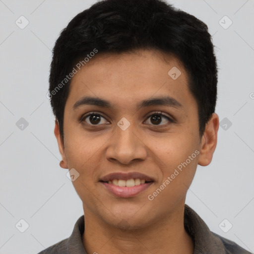 Joyful latino young-adult male with short  black hair and brown eyes