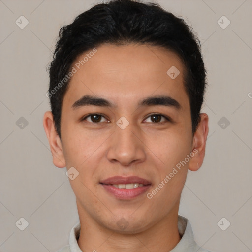 Joyful latino young-adult male with short  brown hair and brown eyes