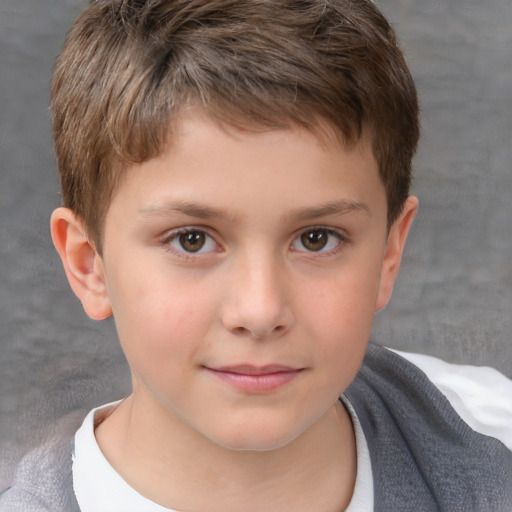 Joyful white child male with short  brown hair and brown eyes