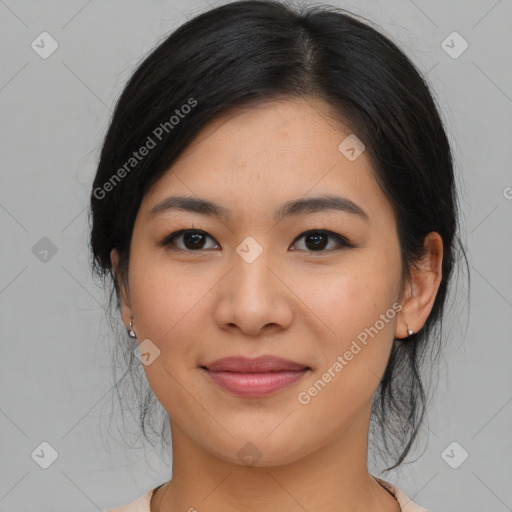 Joyful asian young-adult female with medium  black hair and brown eyes