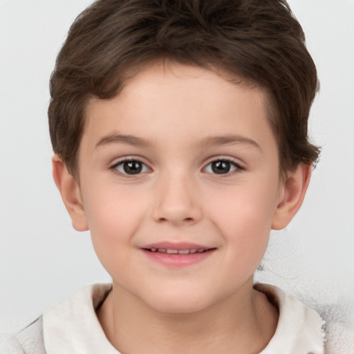 Joyful white child female with short  brown hair and brown eyes