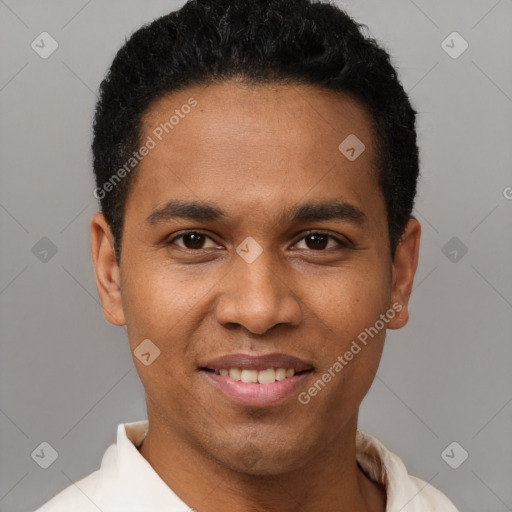 Joyful black young-adult male with short  black hair and brown eyes