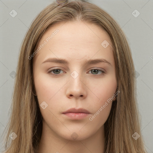 Neutral white young-adult female with long  brown hair and brown eyes