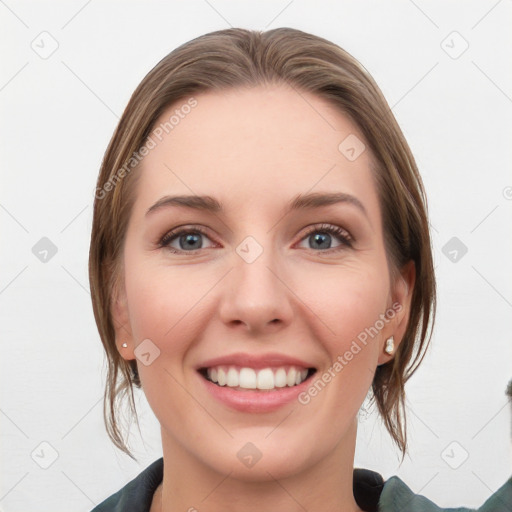 Joyful white young-adult female with medium  brown hair and grey eyes