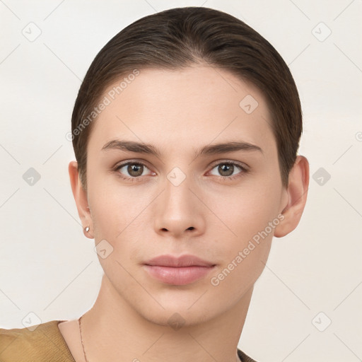 Neutral white young-adult female with short  brown hair and brown eyes