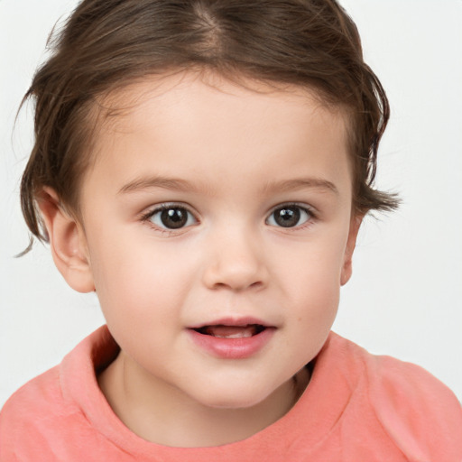 Joyful white child female with short  brown hair and brown eyes