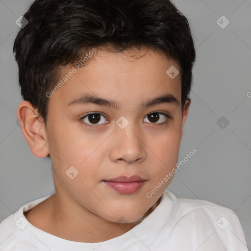 Joyful white child male with short  brown hair and brown eyes