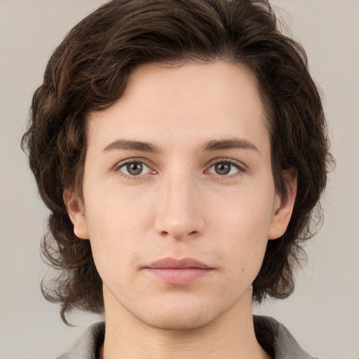 Neutral white young-adult male with medium  brown hair and brown eyes