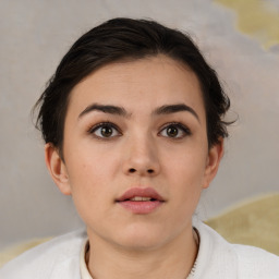 Neutral white young-adult female with short  brown hair and brown eyes