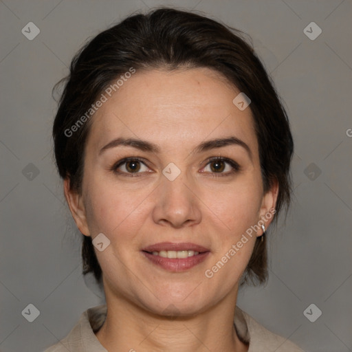 Joyful white adult female with medium  brown hair and brown eyes