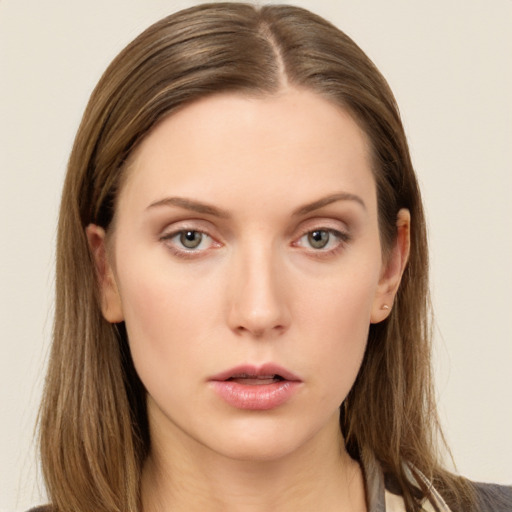 Neutral white young-adult female with long  brown hair and brown eyes