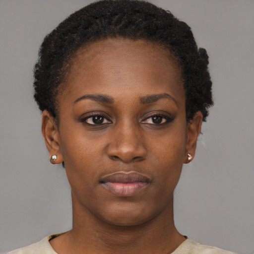 Neutral black young-adult female with short  brown hair and brown eyes