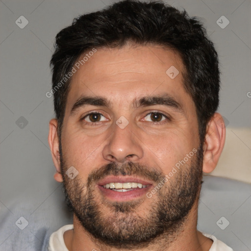 Joyful white adult male with short  brown hair and brown eyes