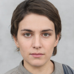 Neutral white young-adult female with medium  brown hair and grey eyes