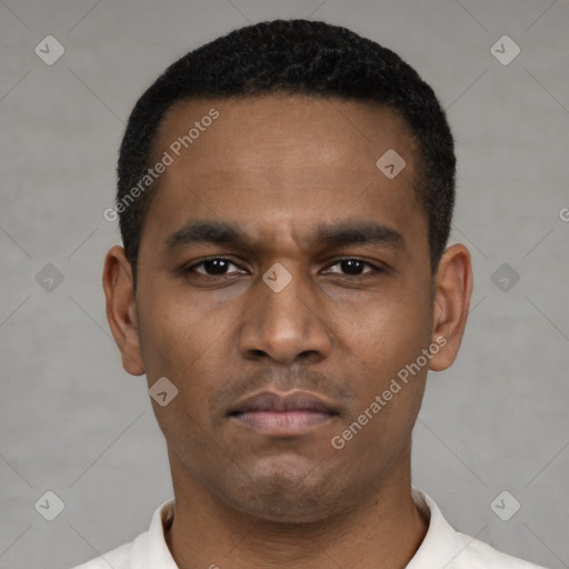Neutral latino young-adult male with short  black hair and brown eyes