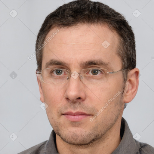 Neutral white adult male with short  brown hair and brown eyes