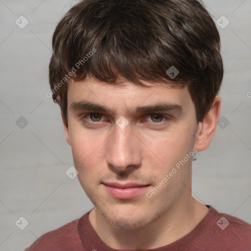 Neutral white young-adult male with short  brown hair and grey eyes