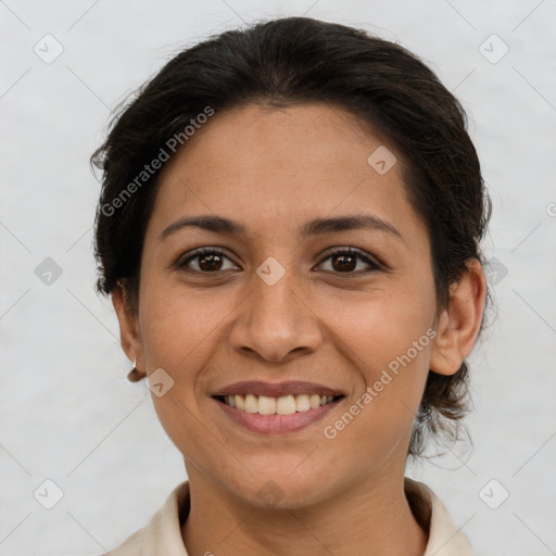 Joyful white adult female with short  brown hair and brown eyes