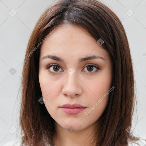 Neutral white young-adult female with long  brown hair and brown eyes