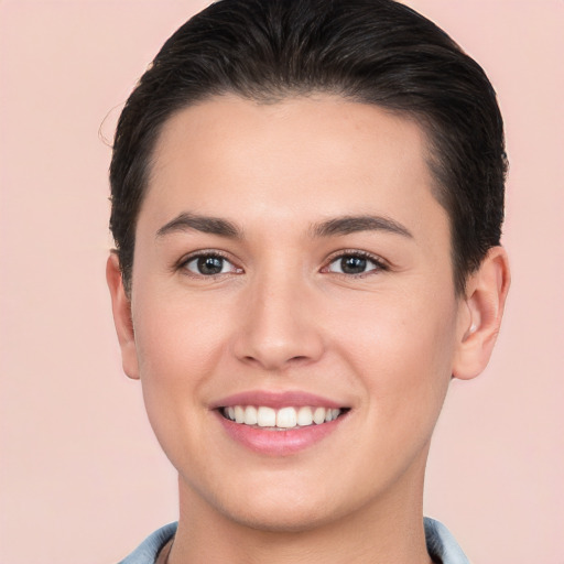 Joyful white young-adult female with short  brown hair and brown eyes