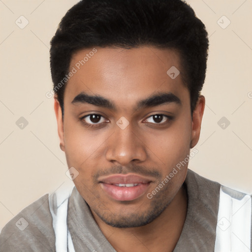 Joyful latino young-adult male with short  black hair and brown eyes