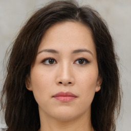 Neutral asian young-adult female with medium  brown hair and brown eyes