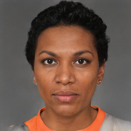 Neutral black young-adult female with short  black hair and brown eyes