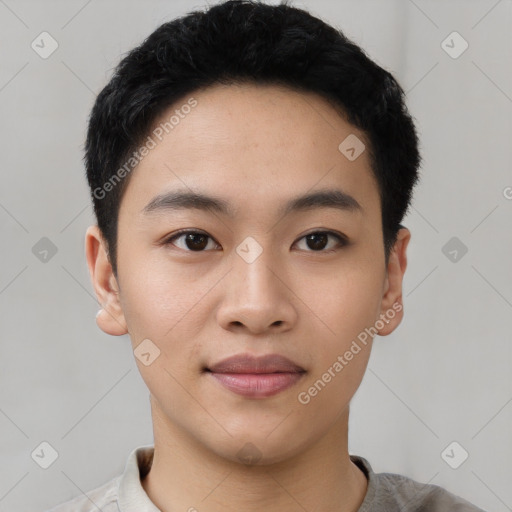 Joyful asian young-adult male with short  black hair and brown eyes