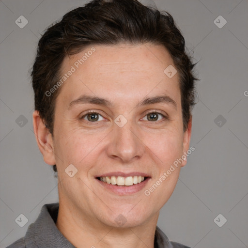 Joyful white adult female with short  brown hair and grey eyes