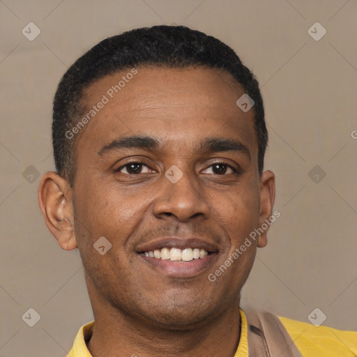 Joyful latino young-adult male with short  brown hair and brown eyes