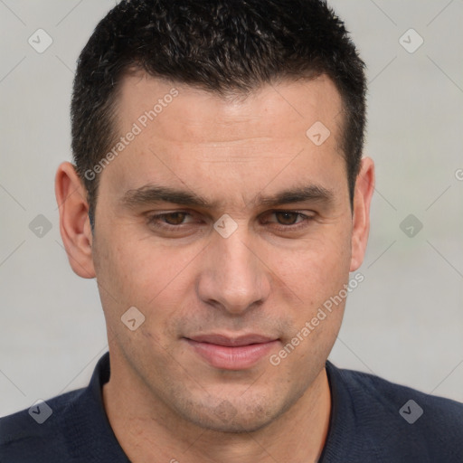 Joyful white adult male with short  brown hair and brown eyes