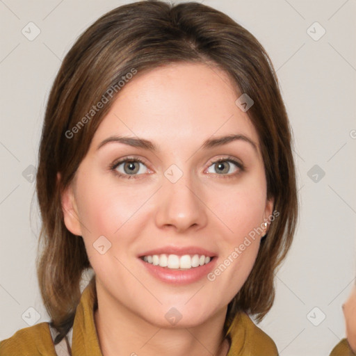 Joyful white young-adult female with medium  brown hair and blue eyes