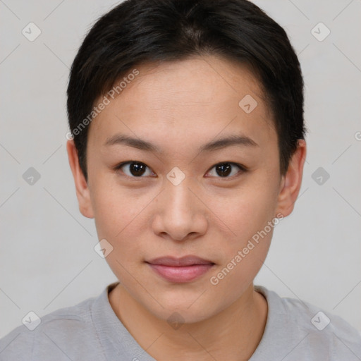 Joyful asian young-adult female with short  brown hair and brown eyes