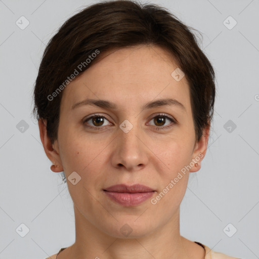 Joyful white adult female with short  brown hair and brown eyes